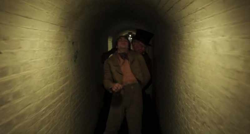 (MEN SHOUTING)