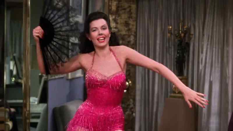 MEN (SINGING): Too darn hot