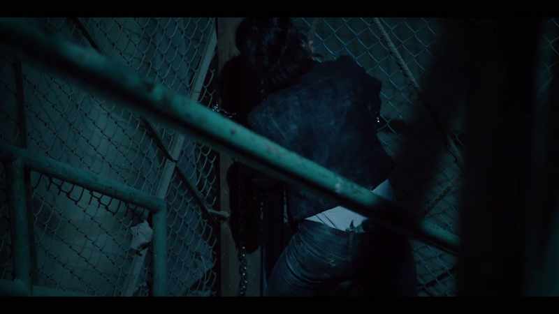 [metal chain rattling]