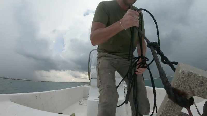 MIKE N.: We got to get this other anchor up without getting electrocuted