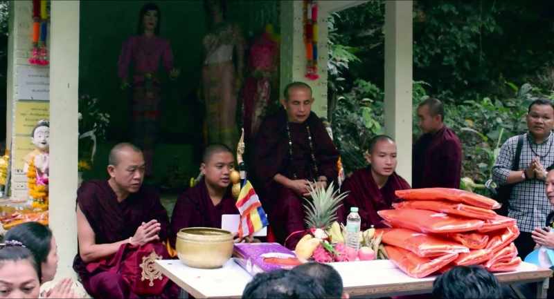 (MONK SPEAKING THAI) -(CROWD SPEAKING THAI)