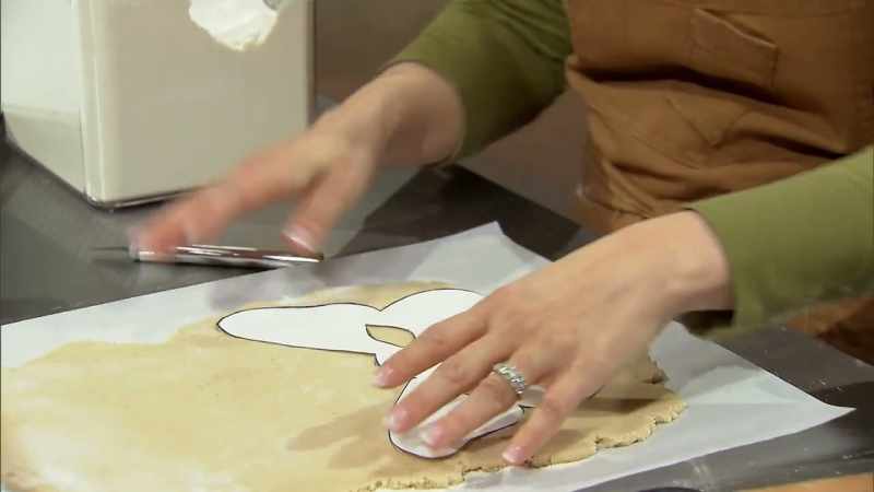 Most cookie makers put the sticks inside the cookie