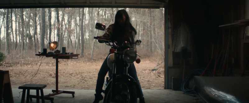 [motorcycle creaking]