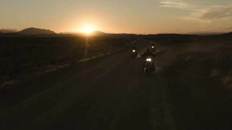 (motorcycles rumbling)