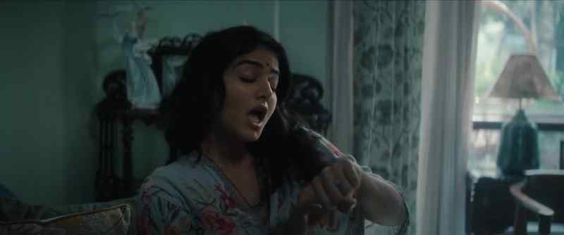 [mouthing words to Hindi song]