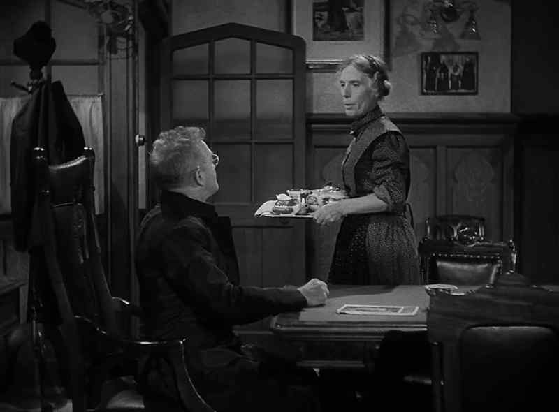 Mrs. Carmody, did the young priest come yet?