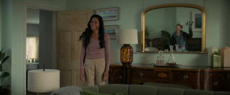 Ms. Carla in the sitting room with a candlestick