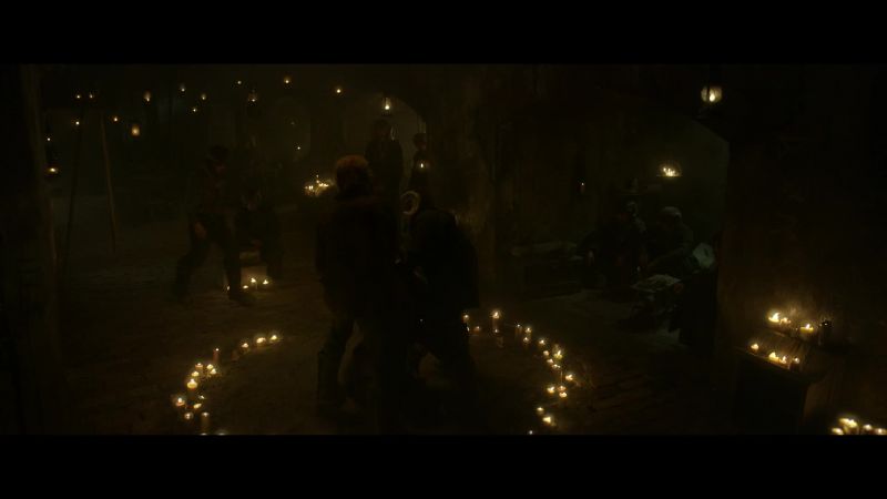 (muffled protests)