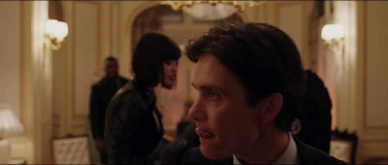 [muffled shouting continues]
