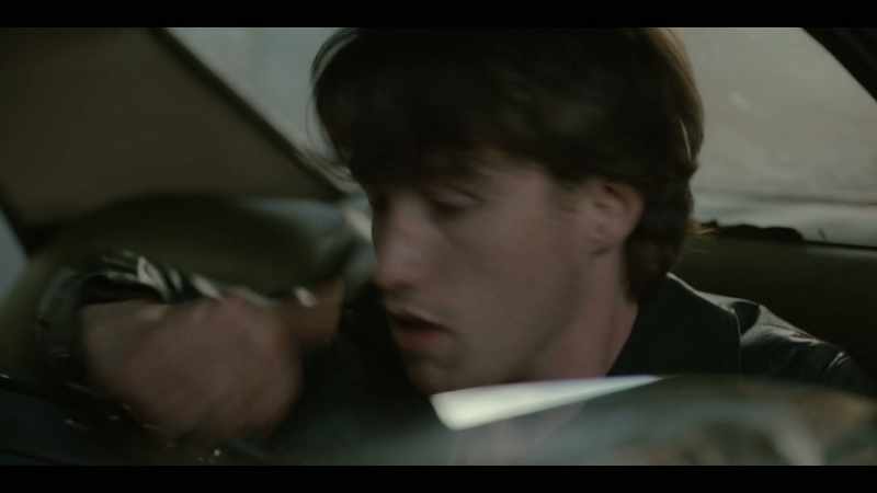 [♪ music blaring on radio]