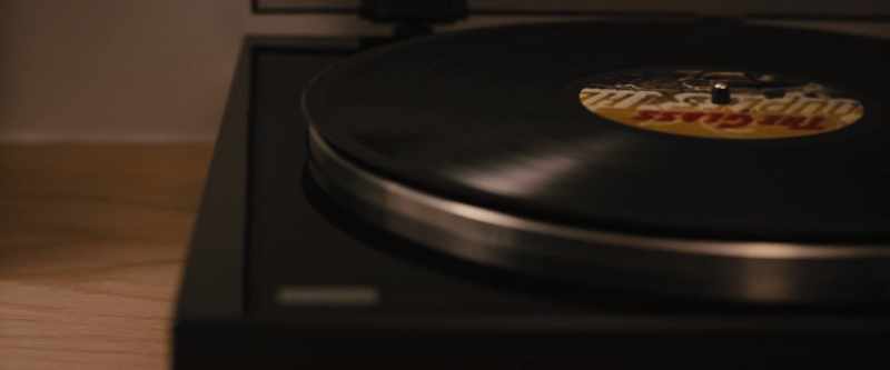 [ Music playing on stereo ]