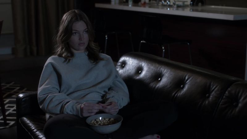 [music playing on TV]