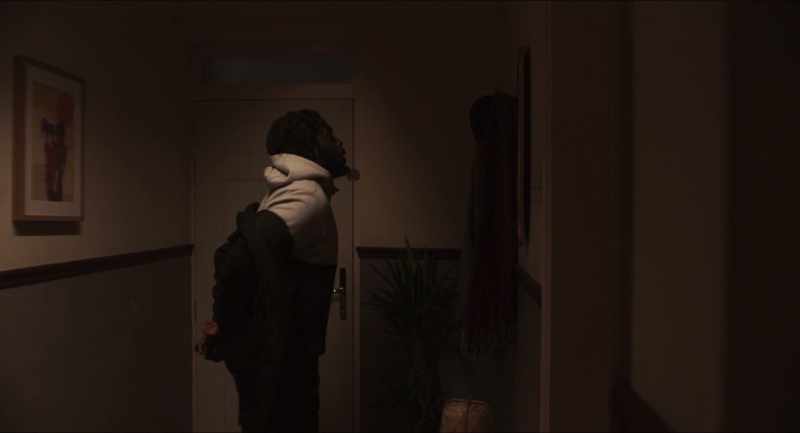 [music playing on TV]
