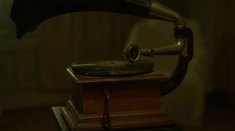 [music playing over gramophone]