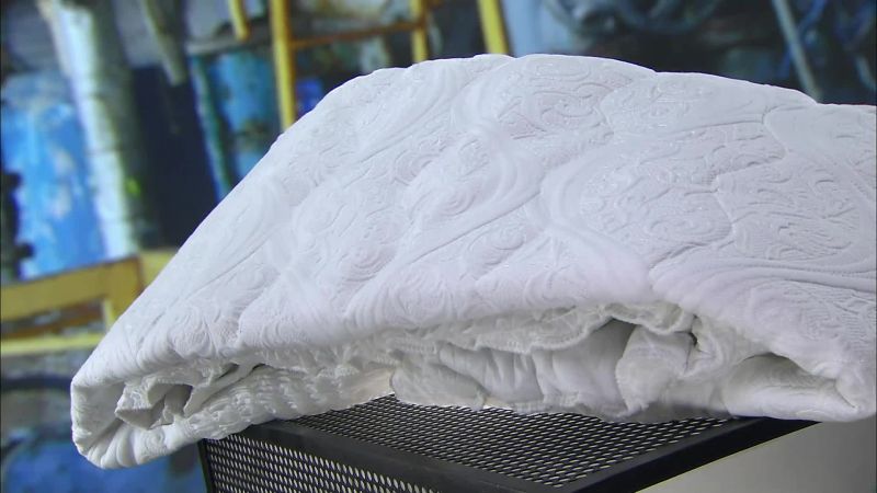 Narrator: A MATTRESS PAD PROTECTS