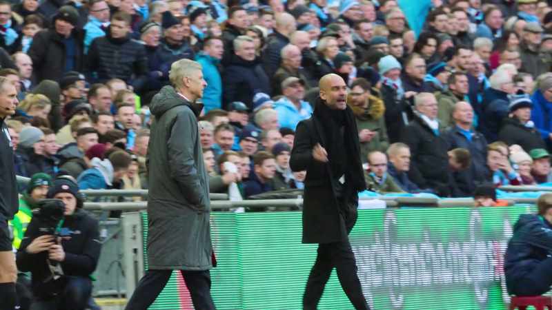 [narrator] As he exchanges words with Pep Guardiola on the touch line