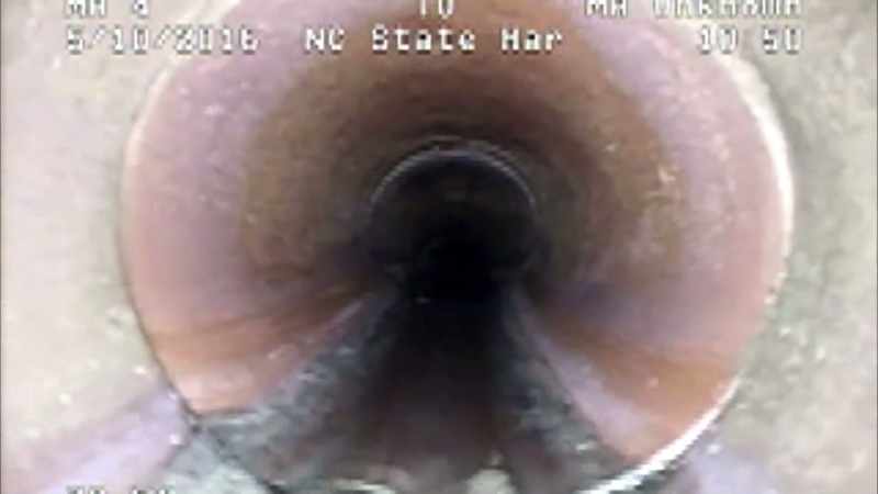 Narrator: AS THE ROBOTIC CAMERA TRACKS THROUGH THE SEWER