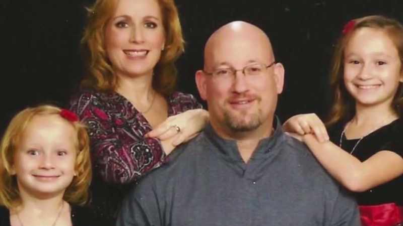 NARRATOR: Her husband, Mark, and two daughters