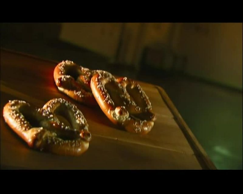 Narrator: HOW AND WHEN THE FIRST PRETZEL CAME TO BE