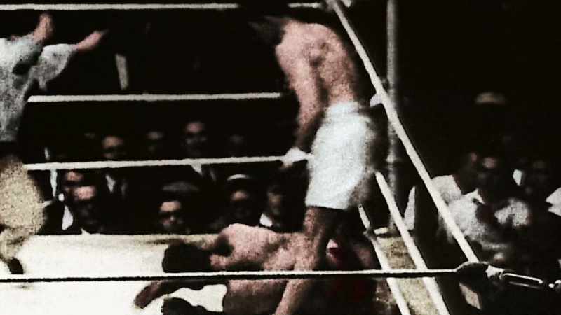 Narrator: IN 1926 HE FIGHTS GENE TUNNEY
