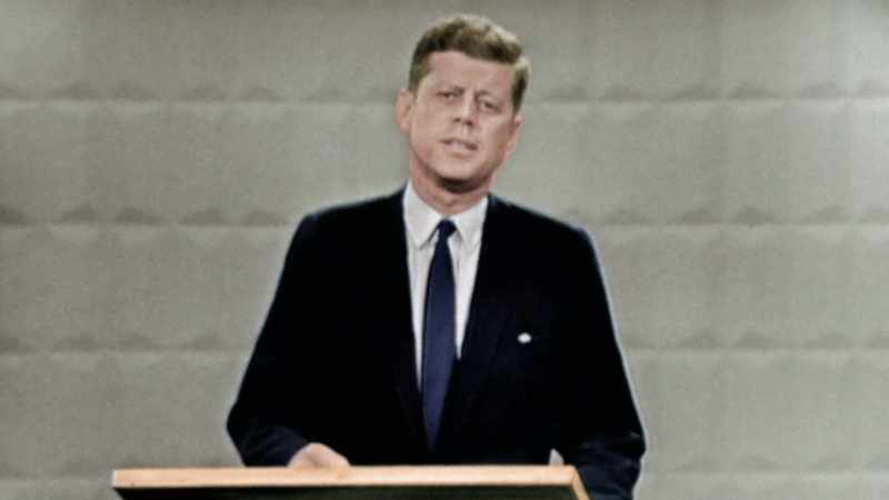 Narrator: JFK IS PREPPED FOR HIS TELEVISION APPEARANCE