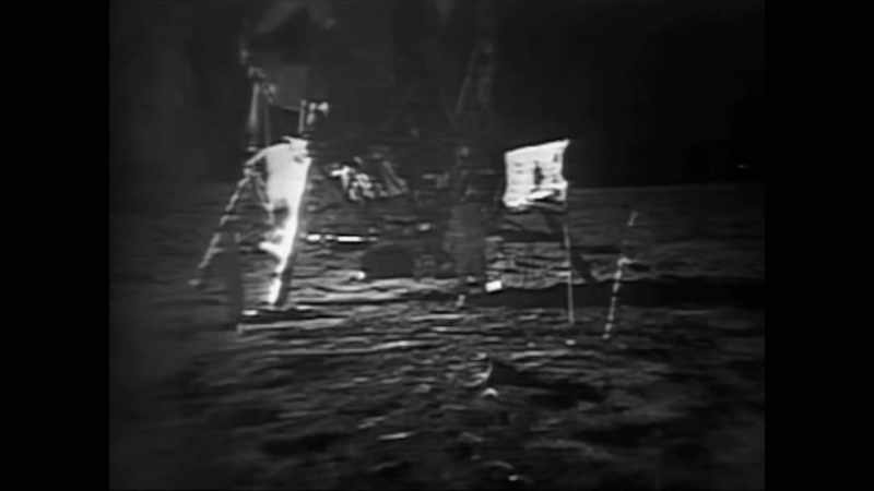 Narrator: Live tv coverage of armstrong and aldrin
