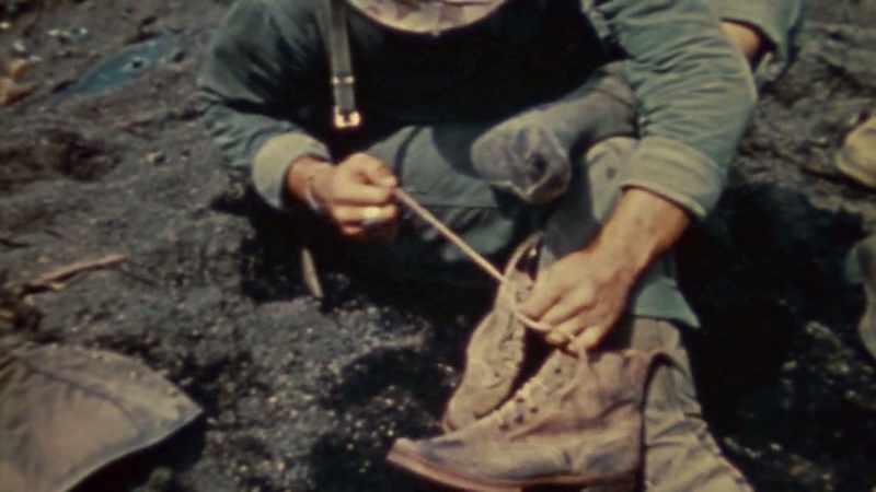 NARRATOR: One Marine even tries on the boots