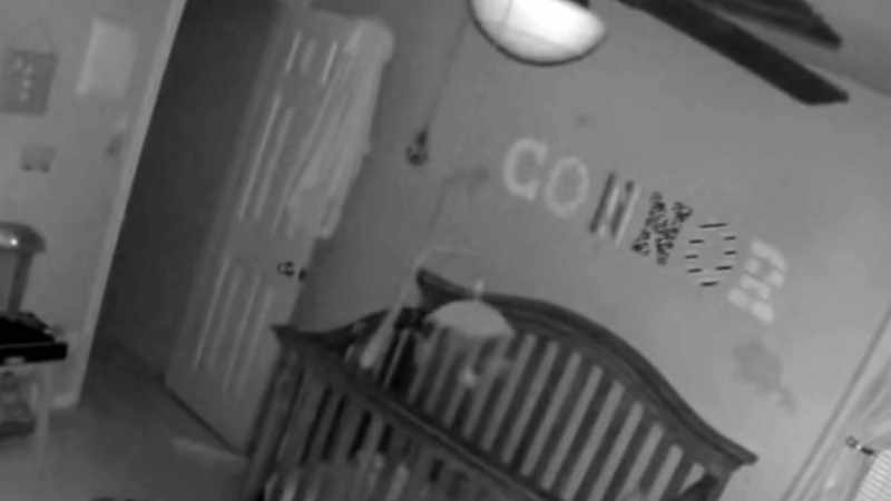 Narrator: THE TODDLER FALLS BACK INTO THE COT, UNHARMED