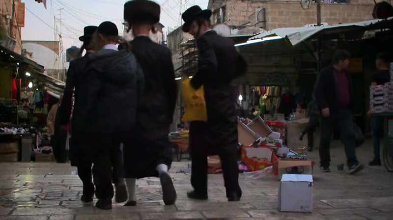 Narrator: Today, modern jerusalem bustles