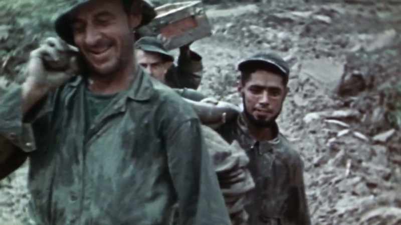 NARRATOR: Troops have to lug ammunition to the front by hand