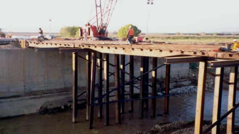 NARRATOR: While the temporary bridge was being built