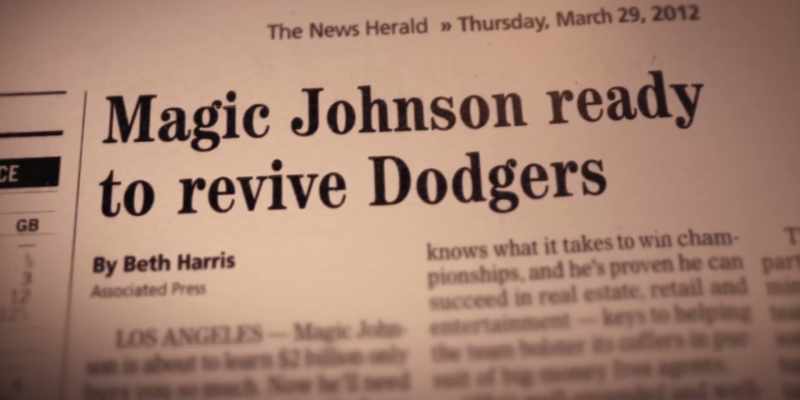 [newscaster 1] Magic Johnson is joining a new team, the LA Dodgers