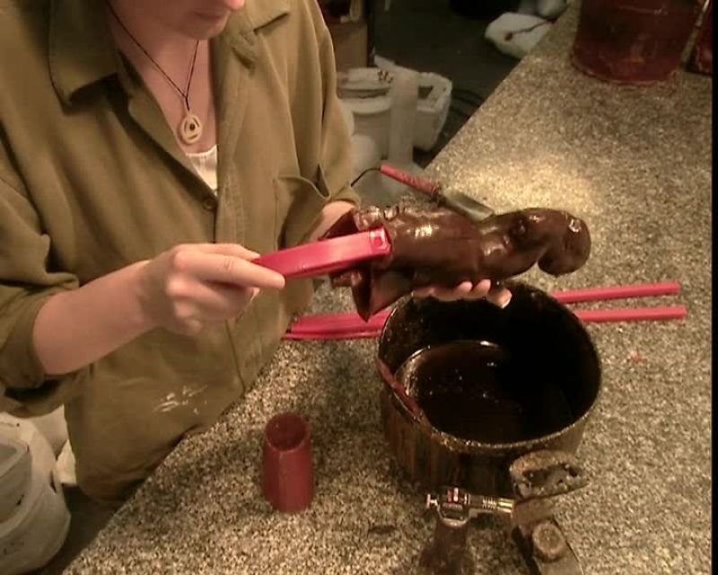 NEXT, THEY ATTACH WHAT'S CALLED A SPREW