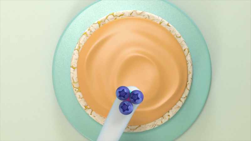 Next, use your blueberries to make cute kitty-cat eyes and a nose