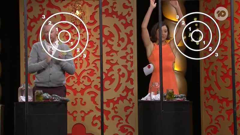 Nina's hit the bullseye. (AUDIENCE CHEERS)