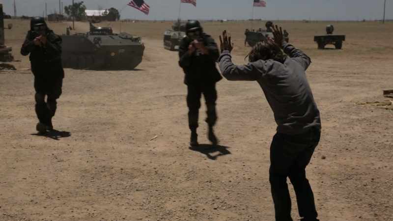 No! Don't shoot! Don't shoot! I'm unarmed!