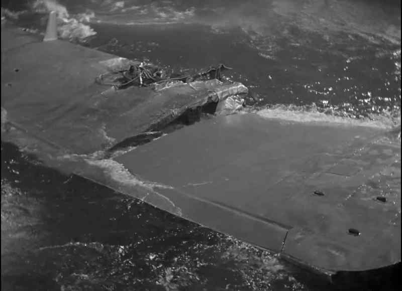 No good staying on here, she's going under. Quick, onto the wing