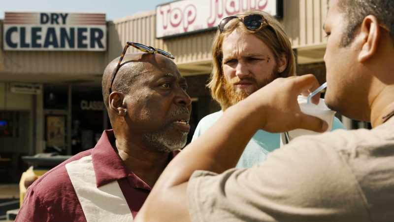 No. No, h-he's the sign-spinner guy for Burt