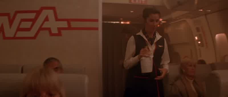 Can I get you anotherNo thank youI only have to look at his facefor another 15 or 20 minutesLadies and gentlemen this is the captain speakingI've just been informed by Dulles Traffic Controlthat