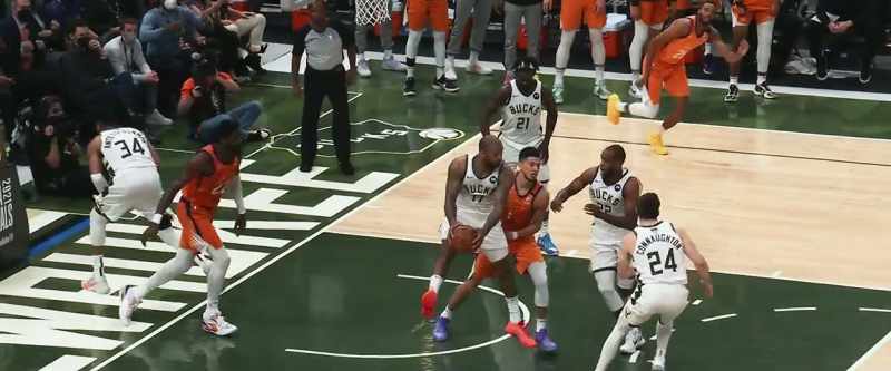 Now Booker throws it up for Ayton