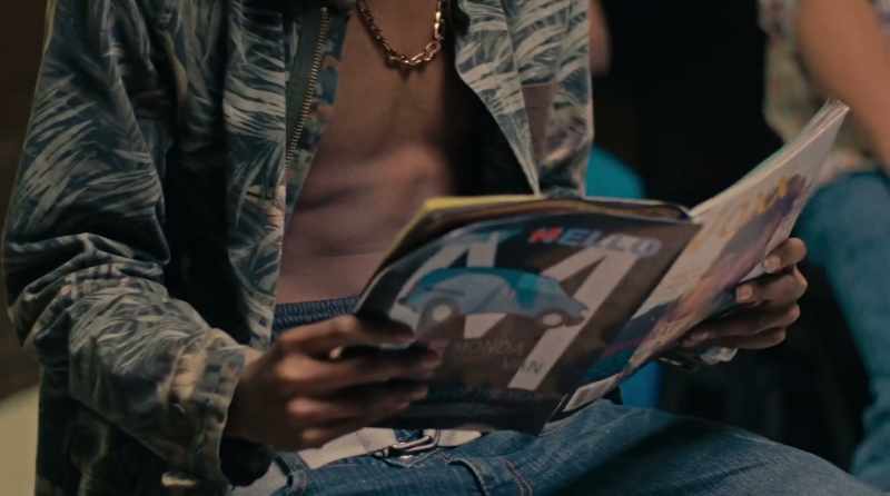 Now this guy reading the magazine here