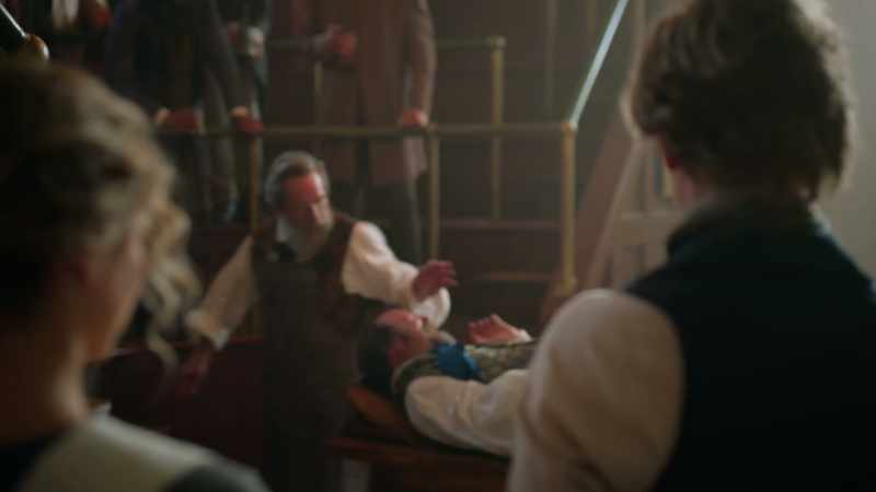 Now, I lower my friend's trousers