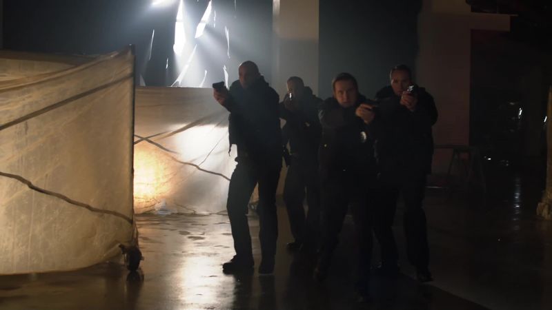 Officer 1: Freeze! Officer 2: Don't move. Don't move!