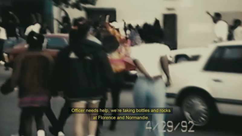 OFFICER: OFFICER NEEDS HELP, WE'RE TAKING BOTTLES AND ROCKS