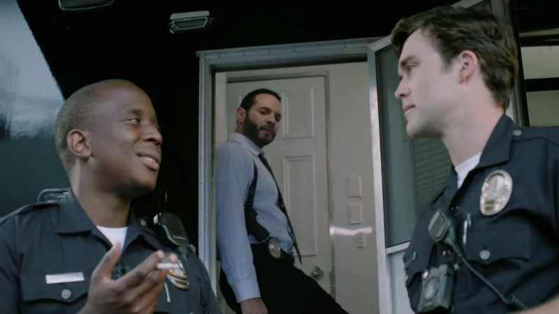 [officers chattering]