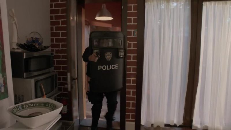 (officers shouting) Move, move, move!