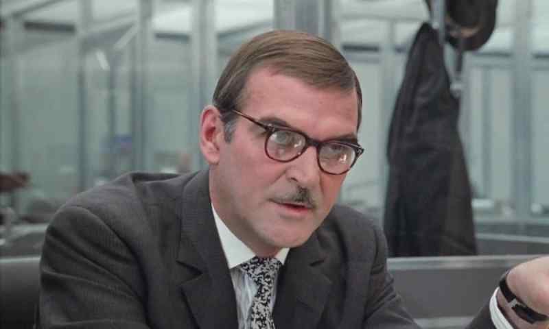 Oh, my God! Don't look round. He's turned up without telephoning first