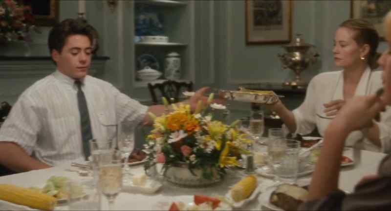 Oh, honey, would you get the little silver corn holders?