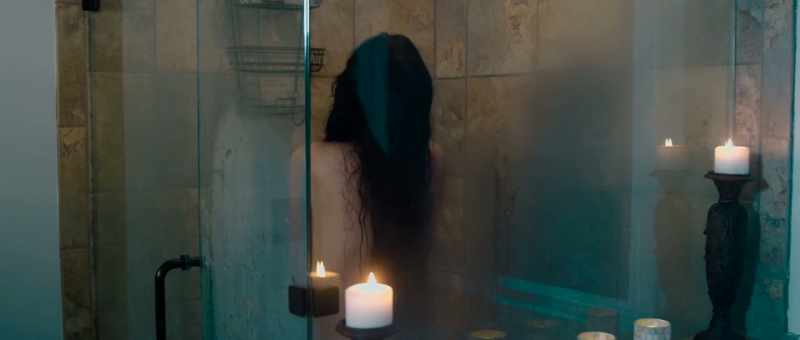 (ominous music) (water running)