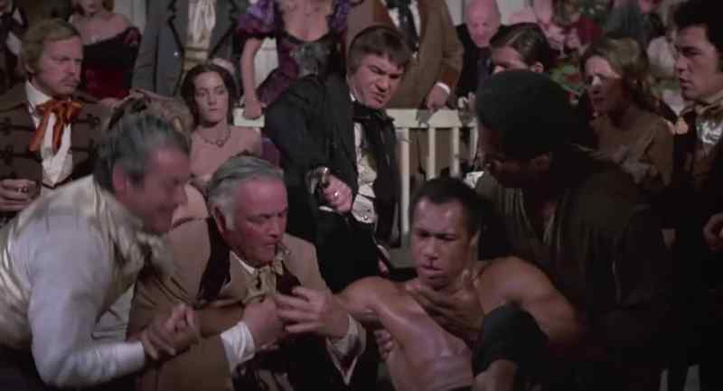 On your feet, you piece of merde! Fight!